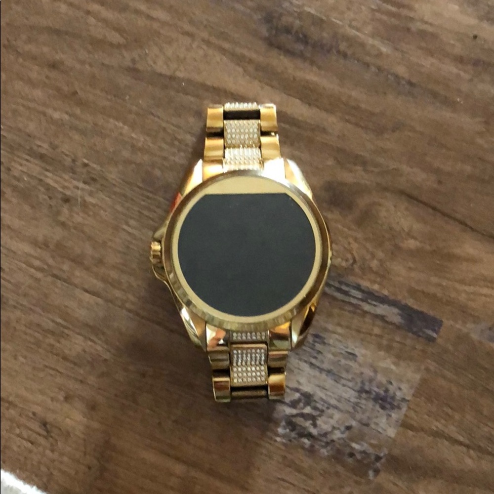 Michael Kors smart watch. Gold diamond band